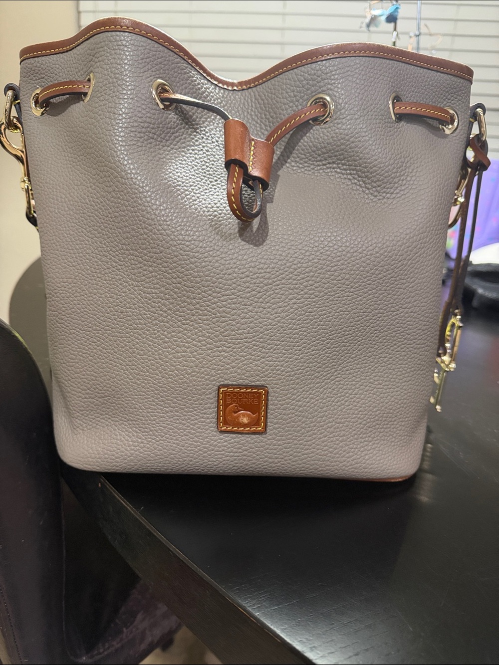 Dooney & Bourke Gray Pebble Leather Drawstring Bucket Bag with Brown Trim